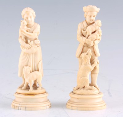 Lot 546 - A PAIR OF LATE 19TH CENTURY CARVED IVORY...