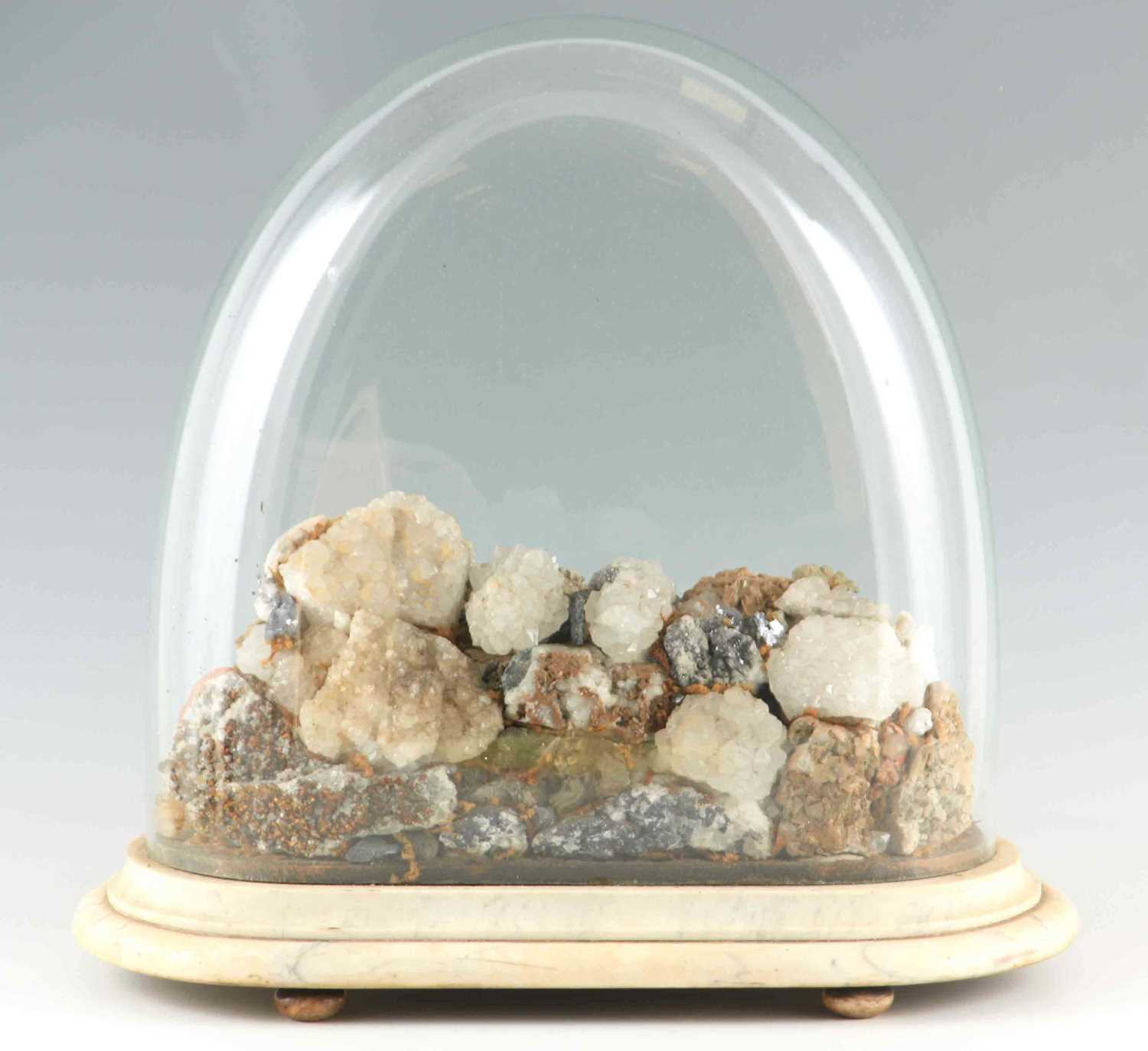 Lot 586 - A 19TH CENTURY ROCK CRYSTAL DISPLAY UNDER A