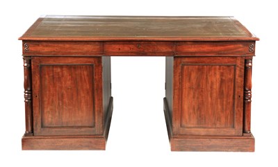 Lot 881 - A LATE GOERGE III MAHOGANY PARTNERS DESK...