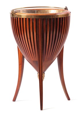 Lot 902 - AN EDWARDIAN MAHOGANY PLANTER with slated body...