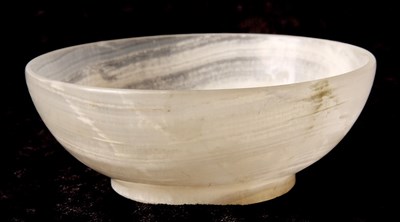 Lot 141 - A LATE 19TH CENTURY ORIENTAL JADE TURNED BOWL...