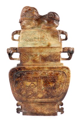 Lot 98 - A LARGE CHINESE CARVED RUSSET JADE URN the lid...