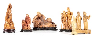 Lot 173a - A GROUP OF SIX CARVED SOAPSTONE FIGURES of...