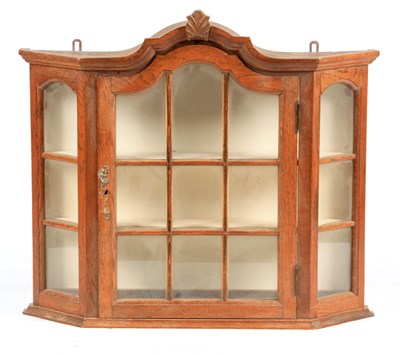 Lot 1030 - AN OAK DUTCH STYLE HANGING CABINET with shaped...