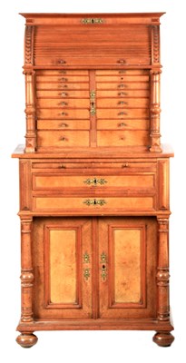 Lot 1066 - A LATE 19TH CENTURY WALNUT DENTIST'S CABINET...