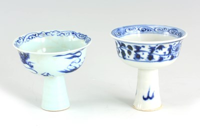 Lot 107 - TWO CHINESE PORCELAIN BLUE AND WHITE STEM CUPS...