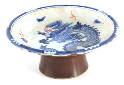 Lot 110 - A CHINESE BLUE AND WHITE FOOTED BOWL decorated...