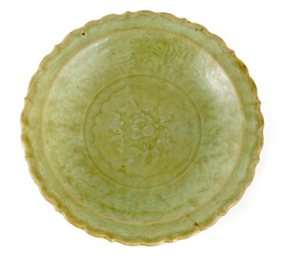 Lot 117 - AN EARLY CHINESE SCALLOPED EDGE CELADON...