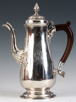 Lot 301 - A GEORGE II SILVER COFFEE POT of footed...