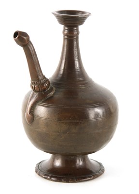 Lot 157 - A 16TH CENTURY TIMURID PERSIAN BRONZE EWER of...