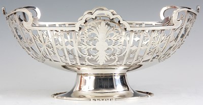 Lot 305 - A SILVER PIERCED BASKET with scrollwork...