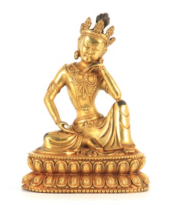 Lot 162 - A GILT BRONZE TIBETAN BUDDHA depicting a...