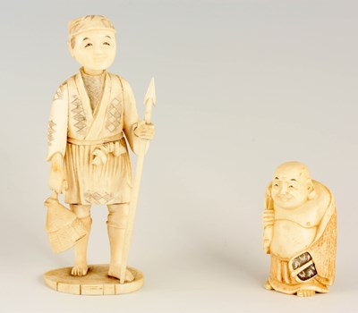 Lot 180 - A CHINESE CARVED IVORY STANDING MALE FIGURE...