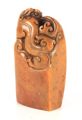 Lot 188 - A CHINESE SOAPSTONE SEAL with carved dragon...