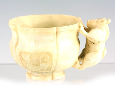 Lot 197 - A CHINESE ARCHAISTIC JADE CUP of leaf-shaped...