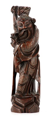 Lot 221 - A 19TH CENTURY CHINESE HARDWOOD CARVED FIGURE...