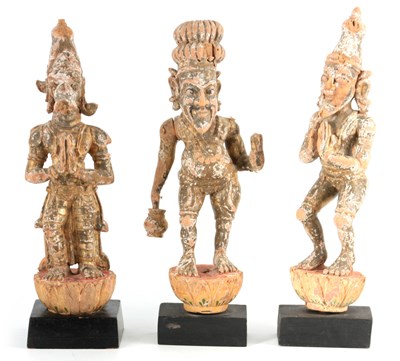 Lot 224 - A SET OF THREE EARLY GILT CARVED TIBETAN...