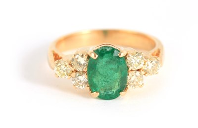 Lot 255 - A LADIES 18CT YELLOW GOLD EMERALD AND DIAMOND...