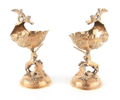 Lot 329 - A PAIR OF GEORGE V SILVER GILT TABLE SALTS...