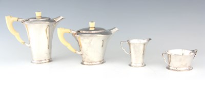 Lot 345 - A GEORGE VI FOUR PIECE SILVER TEA AND COFFEE...