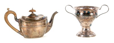 Lot 359 - AN EDWARD VII SMALL OVAL SILVER TEAPOT with...