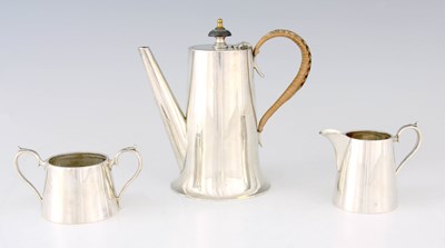 Lot 367 - A 1920'S SILVER THREE PIECE TEA SET of tapered...