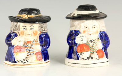 Lot 38 - A PAIR OF COLOURFUL SEATED TOBY FIGURE LIDDED...