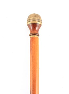 Lot 448 - A 19TH CENTURY MALACCA CANE WALKING STICK WITH...