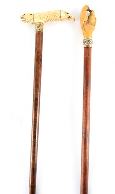 Lot 458 - A 19TH CENTURY CARVED WALKING STICK with...