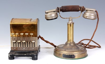 Lot 588 - AN EARLY 20th CENTURY BRASS ERICSSON TELEPHONE...