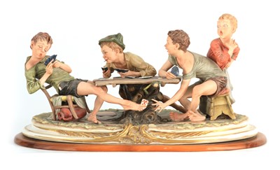 Lot 47 - A NAPLES CAPODIMONTE LARGE OVAL FIGURE GROUP...