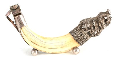 Lot 476 - AN EARLY 20TH CENTURY SILVER MOUNTED BOAR TUSK...