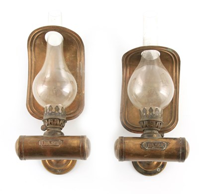 Lot 492 - A PAIR OF LATE 19TH CENTURY BRASS OIL BURNING...