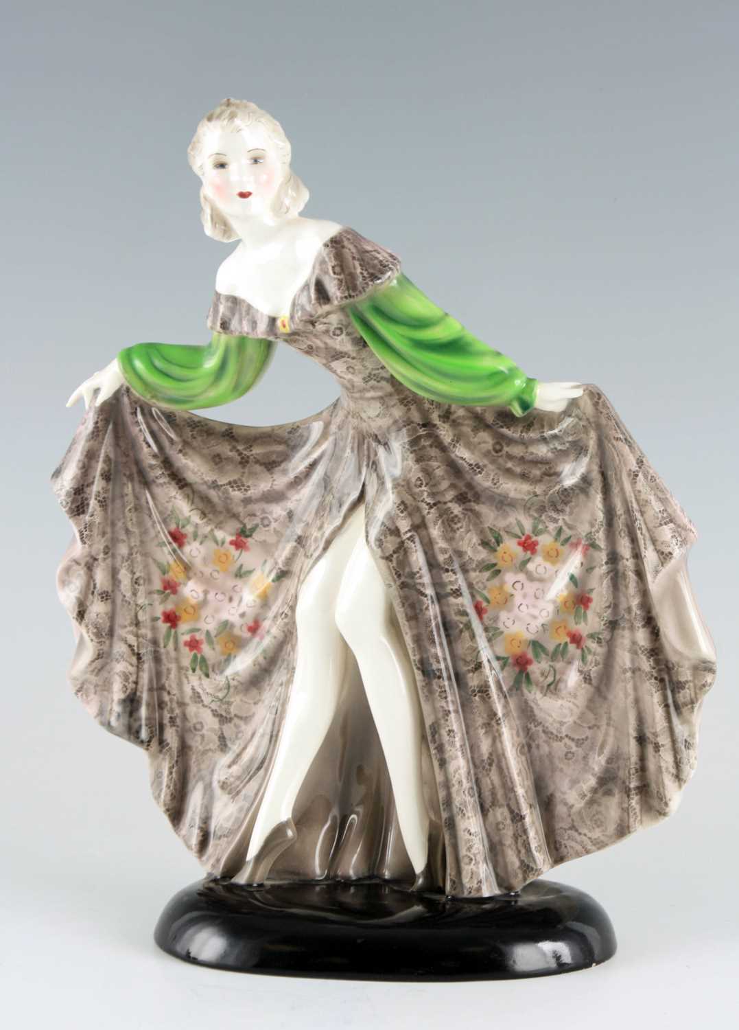 Lot 52 - A STYLISH GOLDSCHEIDER STANDING FIGURE OF A