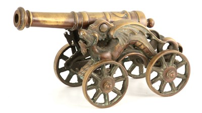 Lot 591 - A 19TH CENTURY BRONZE STARTING CANNON mounted...