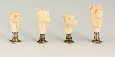 Lot 620 - A SET OF FOUR FINELY CARVED IVORY AND NICKLE...