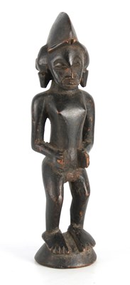 Lot 624 - AN 19TH CENTURY AFRICAN CARVED TRIBAL STANDING...