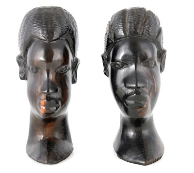 Lot 651 - TWO CARVED EBONY AFRICAN BUSTS 13cm high