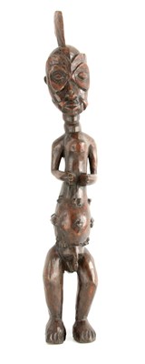 Lot 652 - A 19TH CENTURY AFRICAN TRIBLE CARVED WOOD...