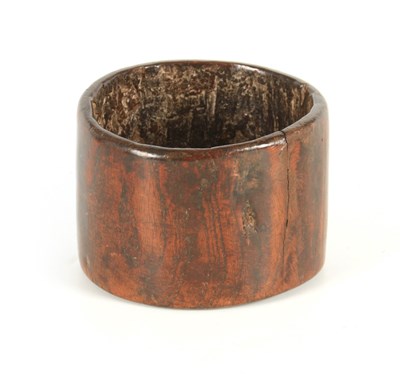 Lot 660 - AN 18TH CENTURY LIGNUM VITAE TREEN DUG OUT POT...