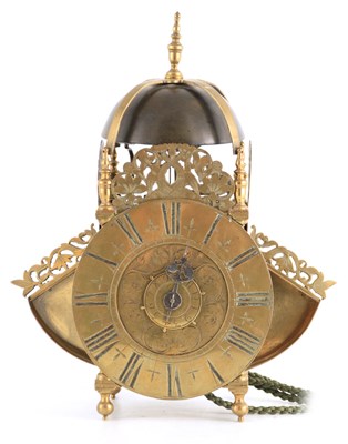 Lot 877 - A LATE 17TH CENTURY BRASS WINGED LANTERN CLOCK...