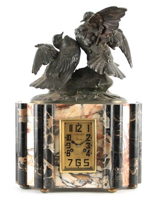 Lot 894 - A LARGE ART DECO BRONZED AND MARBLE MANTEL...