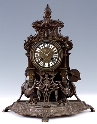 Lot 628 - A FRENCH LATE 19TH CENTURY BRONZE MANTEL CLOCK...