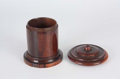 Lot 1003 - A 19TH CENTURY LIGNUM VITAE CYLINDRICAL STRING...