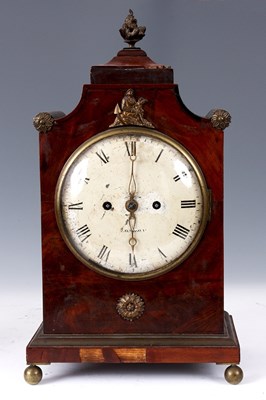 Lot 638 - A LATE REGENCY MAHOGANY BRACKET CLOCK the 7"...