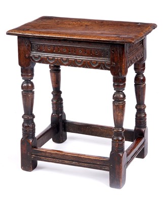 Lot 739 - A 17TH CENTURY OAK JOINT STOOL with pegged top...