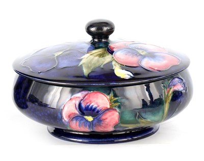 Lot 127 - A MOORCROFT SHALLOW FOOTED BOWL AND COVER tube...