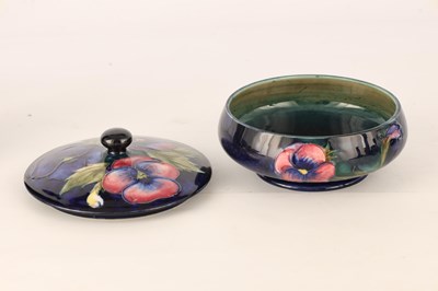 Lot 127 - A MOORCROFT SHALLOW FOOTED BOWL AND COVER tube...