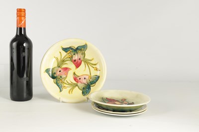 Lot 129 - A MOORCROFT SHALLOW DISH tube lined and...