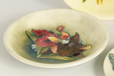 Lot 129 - A MOORCROFT SHALLOW DISH tube lined and...
